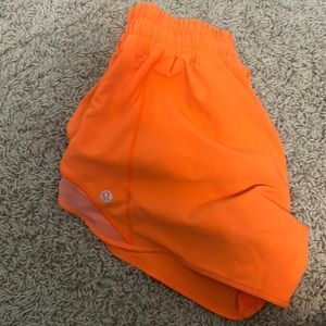 hilight orange lululemon hotty hot shorts, size 2